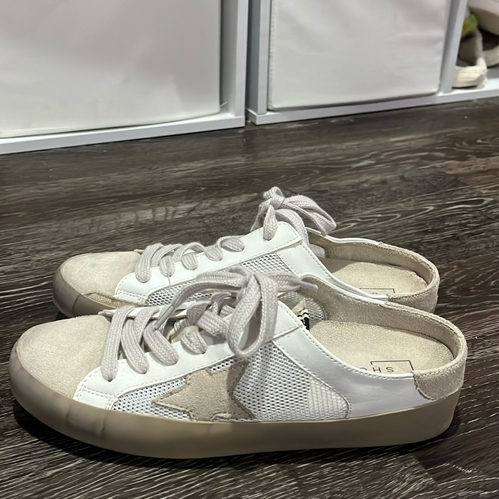 The brand is Shu Shop they are beige toned and size 6 1/2